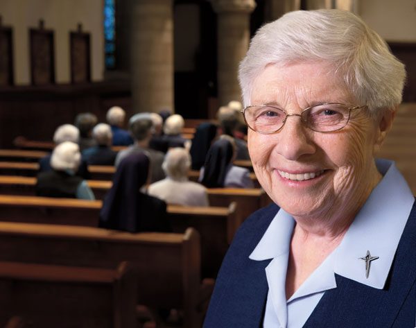 Members of the U.S. Conference of Catholic Bishops pray before the second day of proceedings at the bishops' annual fall meeting Nov. 12 in Baltimore. (CNS photo/Nancy Phelan Wiechec)